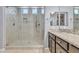 This walk-in shower features gorgeous tile surround, bench, and great lighting at 20765 E Raven Dr, Queen Creek, AZ 85142