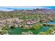 Stunning aerial shot showcasing the lake, golf course, and mountain views surrounding the community at 20801 N 90Th Pl # 271, Scottsdale, AZ 85255
