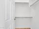 Walk-in closet with rods, offering ample storage space and organization options at 20801 N 90Th Pl # 271, Scottsdale, AZ 85255
