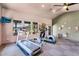 This workout room features multiple windows, and various workout machines, including a treadmill and elliptical at 20801 N 90Th Pl # 271, Scottsdale, AZ 85255