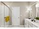 Modern bathroom with glass shower and ample vanity space at 23417 W Burton Ave, Buckeye, AZ 85326