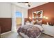 Charming bedroom with butterfly art and soft, inviting bedding at 23417 W Burton Ave, Buckeye, AZ 85326