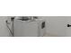 Efficient laundry room featuring a modern, front-loading washer and dryer set for convenient chores at 23417 W Burton Ave, Buckeye, AZ 85326