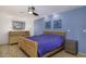 Cozy bedroom with wood furniture, a ceiling fan, and recessed lighting at 2426 E Turquoise Dr, Phoenix, AZ 85028