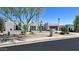 Single story home with desert landscaping and a beautiful blue front door at 2426 E Turquoise Dr, Phoenix, AZ 85028