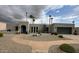 Contemporary home with desert landscaping, including cacti, gravel, and a walkway to the front door at 2426 E Turquoise Dr, Phoenix, AZ 85028