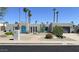 Charming single-story home with a blue door and desert landscaping at 2426 E Turquoise Dr, Phoenix, AZ 85028