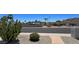 Front yard of home with desert landscaping and mountain views in the distance at 2426 E Turquoise Dr, Phoenix, AZ 85028