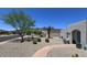 Desert landscaping in front yard with mountain views in the distance at 2426 E Turquoise Dr, Phoenix, AZ 85028