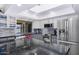 Bright kitchen with granite counters, skylight, stainless appliances, and outside view from the sink at 2426 E Turquoise Dr, Phoenix, AZ 85028