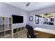 Bright office space with built-in shelves and outdoor view at 2426 E Turquoise Dr, Phoenix, AZ 85028