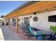 Patio featuring chaise lounges, string lights, and beautiful wood ceiling at 2426 E Turquoise Dr, Phoenix, AZ 85028
