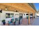 Covered patio featuring wood ceiling, tile floor, and outdoor dining area at 2426 E Turquoise Dr, Phoenix, AZ 85028