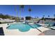 Backyard pool with turquoise water, surrounded by desert landscaping, patio furniture, and mountain views at 2426 E Turquoise Dr, Phoenix, AZ 85028