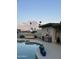 Poolside area with a hot tub, built-in BBQ, and covered patio at 2426 E Turquoise Dr, Phoenix, AZ 85028
