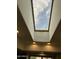 Bright skylight provides natural light over the kitchen area, illuminating cabinetry at 2426 E Turquoise Dr, Phoenix, AZ 85028