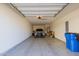 Spacious two-car garage with epoxy flooring, providing ample parking and storage at 2660 S Equestrian Dr # 103, Gilbert, AZ 85295