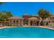 Inviting community pool with clubhouse offers residents a place to relax and socialize at 2660 S Equestrian Dr # 103, Gilbert, AZ 85295