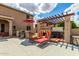 Outdoor space with BBQ, spa, lounge chairs, and a pergola for shady relaxation at 26853 N 89Th Dr, Peoria, AZ 85383