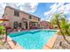 Inviting backyard pool with clear water and a basketball hoop, perfect for outdoor fun at 26853 N 89Th Dr, Peoria, AZ 85383