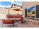 Cozy outdoor firepit with built-in seating at 26853 N 89Th Dr, Peoria, AZ 85383
