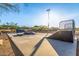 A modern skate park offers a variety of ramps and rails for skateboarding enthusiasts at 26853 N 89Th Dr, Peoria, AZ 85383