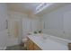 Neutral bathroom featuring a tub, shower, and spacious vanity with a large mirror, providing ample space at 287 W Liberty Ln, Gilbert, AZ 85233