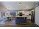 Bright kitchen with white cabinetry, stainless steel appliances, and center island at 287 W Liberty Ln, Gilbert, AZ 85233