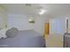Comfortable main bedroom with neutral tones and a large bed at 287 W Liberty Ln, Gilbert, AZ 85233