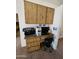Desk area with built in cabinets and drawers at 3002 W Tonopah Dr, Phoenix, AZ 85027