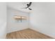 Well-lit bedroom with modern ceiling fan and bright window at 3434 E Baseline Rd # 265, Phoenix, AZ 85042