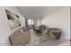 Comfortable living room features neutral colors, stylish furniture, and ample natural light at 3916 S 98Th Ln, Tolleson, AZ 85353