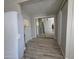 Bedroom featuring laminate flooring, a ceiling fan, and sliding door closet at 4065 E University Dr # 242, Mesa, AZ 85205