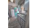 Efficient kitchen features light gray cabinets, modern countertops, and white appliances at 4065 E University Dr # 242, Mesa, AZ 85205