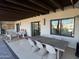 Charming outdoor patio with comfortable seating and a large dining table, perfect for al fresco dining and relaxation at 4065 E University Dr # 242, Mesa, AZ 85205