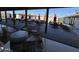 Relaxing outdoor seating area with shaded tables and chairs, creating a comfortable space to unwind and enjoy the surroundings at 4065 E University Dr # 242, Mesa, AZ 85205
