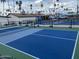Community pickleball courts with new nets at 4065 E University Dr # 242, Mesa, AZ 85205