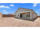 Spacious backyard with potential for landscaping and outdoor enjoyment at 42460 W Peters Dr, Maricopa, AZ 85138