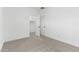 Inviting bedroom features a closet, neutral color palette, and plush carpeting at 42460 W Peters Dr, Maricopa, AZ 85138