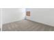Bright bedroom with carpet, natural light and neutral colors, perfect for relaxation at 42460 W Peters Dr, Maricopa, AZ 85138