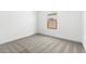 Neutral bedroom with soft carpeting, ample natural light, and serene atmosphere at 42460 W Peters Dr, Maricopa, AZ 85138