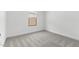 Comfortable bedroom featuring carpet flooring, neutral colors, and a window at 42460 W Peters Dr, Maricopa, AZ 85138