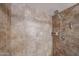 Tiled shower with shower head and soap dish at 4530 W Larkspur Dr, Glendale, AZ 85304