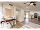 Entryway featuring modern art and a view of the kitchen and sliding glass door at 4538 E Shomi St, Phoenix, AZ 85044