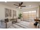 Comfortable sitting room with a view to the outdoor patio through sliding glass doors at 4538 E Shomi St, Phoenix, AZ 85044