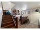 Finished basement with stairs, bar, and small window for natural light at 5044 W Electra Ln, Glendale, AZ 85310