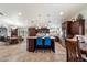 Spacious kitchen features an island, stainless steel appliances, and granite countertops at 5044 W Electra Ln, Glendale, AZ 85310