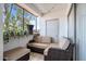 Enclosed balcony featuring an outdoor sitting area at 540 N May -- # 2110, Mesa, AZ 85201