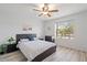 Cozy bedroom with wood floors, plenty of light, and black nightstands at 540 N May -- # 2110, Mesa, AZ 85201