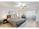 Inviting bedroom with natural light, a ceiling fan, and ample closet space at 540 N May -- # 2110, Mesa, AZ 85201